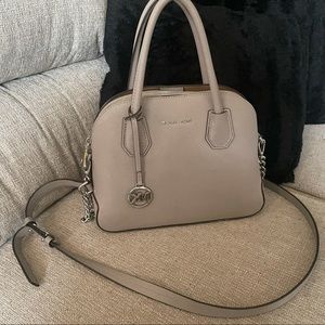 Gray Michael Kors purse.